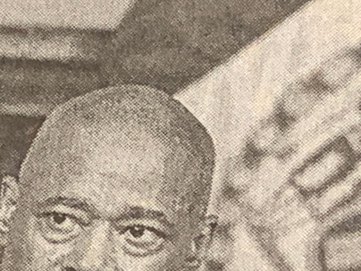 Detail of photo in the print edition of the New York Times, portion of the head of Eric Adams