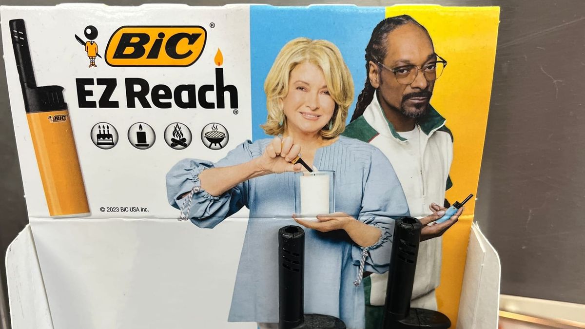 A BiC lighter point of purchase display for the BiC EZ Reach lighter featuring an image of smilingMartha Stewart lighting a candle and an unsmiling Snoop Dogg holding the lighter product