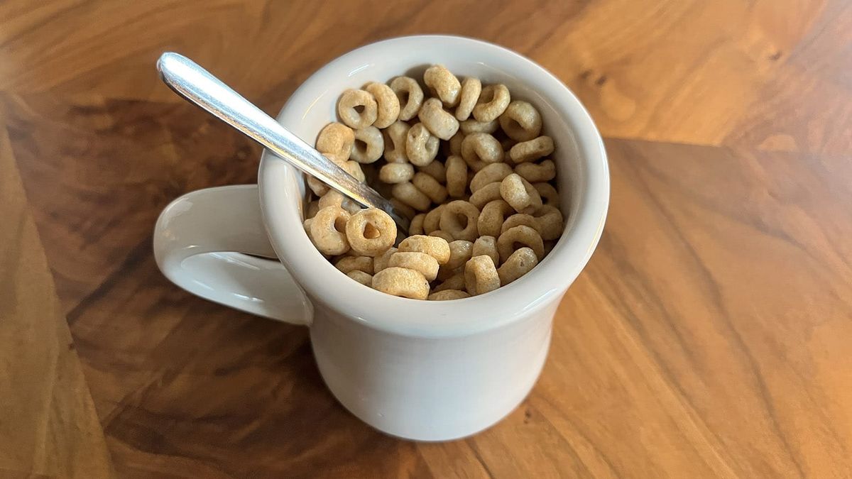 A coffee mug full of breakfast cerea
