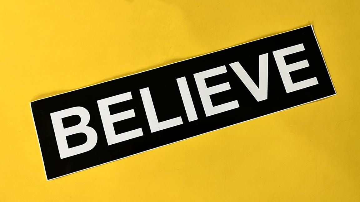 Bumper sticker: BELIEVE 