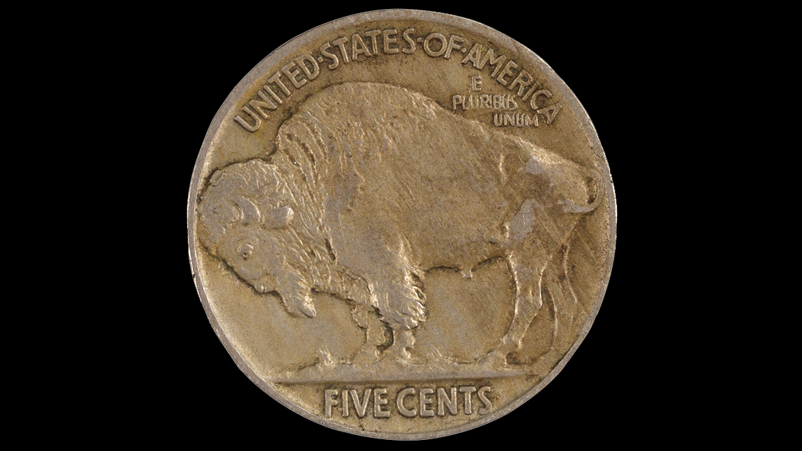 An old Buffalo Nickel: UNITED STATES OF AMERICA - E PLURIBUS UNUM - FIVE CENTS