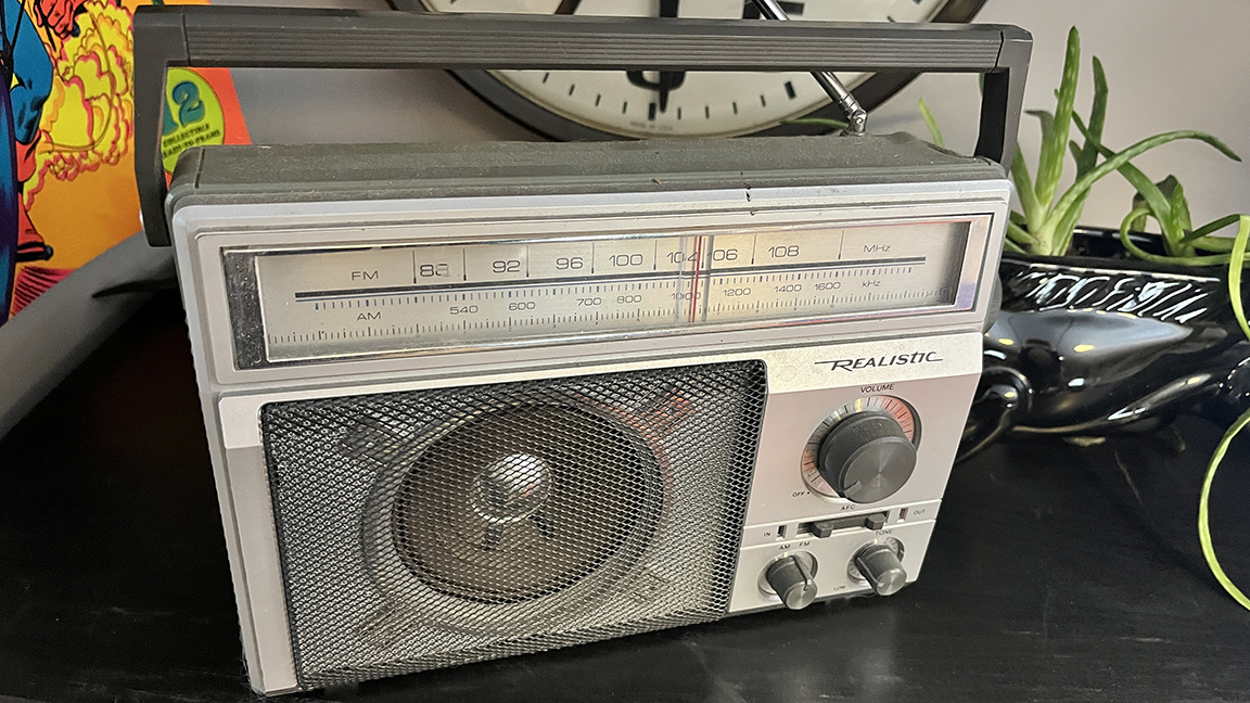 My REALISTIC 12-65 AM/FM transistor radio AC or DC powered
