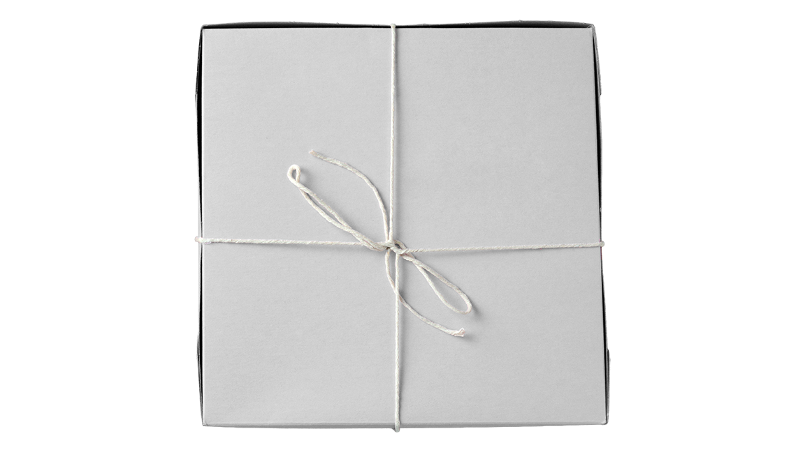 A white paperboard box secure with string