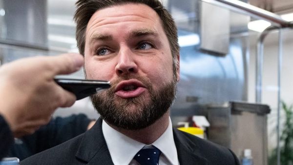 The senator speaking as someone records his words with a phone