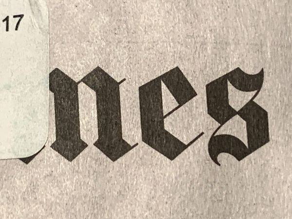Photo of the subscription delivery sticker obscuring the NYT banner as discussed in today's podcast.
