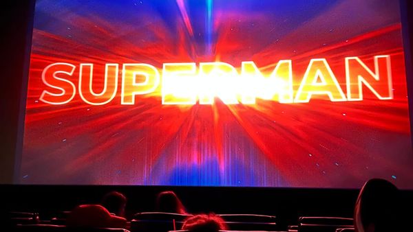 Title for SUPERMAN on a movie screen