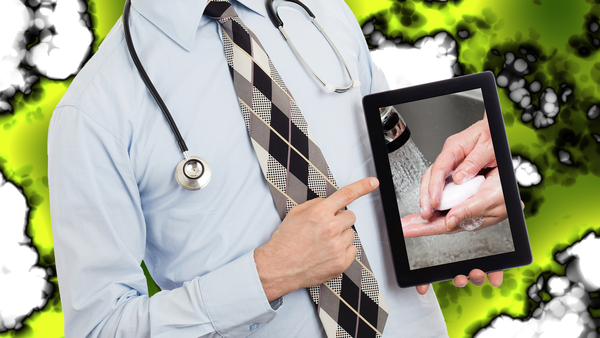 A doctor-type person with stethoscope around their neck and there's a background of goopy-looking bacteria and the doc is holding a tablet and there's an image of someone washing their hands.