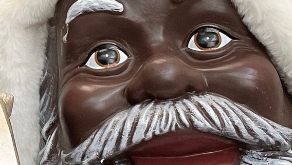 Black Santa greeter statue at the CVS