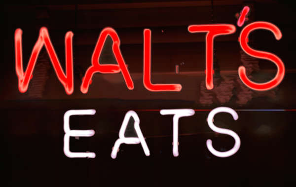 Neon sign: WALT'S EATS