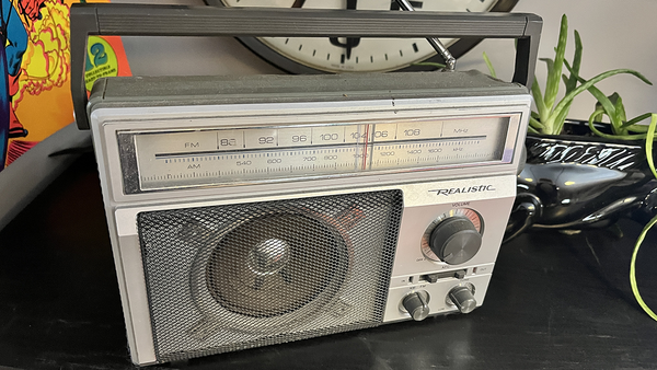 My REALISTIC 12-65 AM/FM transistor radio AC or DC powered