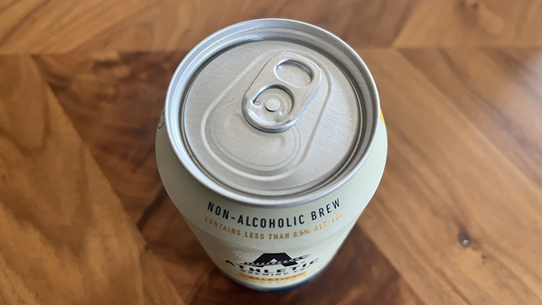 Can of ATHLETIC BREWING CO. beer, "NON-ALCOHOLIC BREW - CONTAINS LESS THAN 0.5% ALCOHOL."