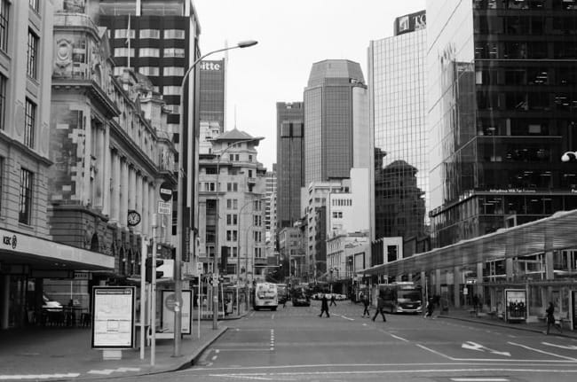 Black and white image of Queen Street in Auckland.