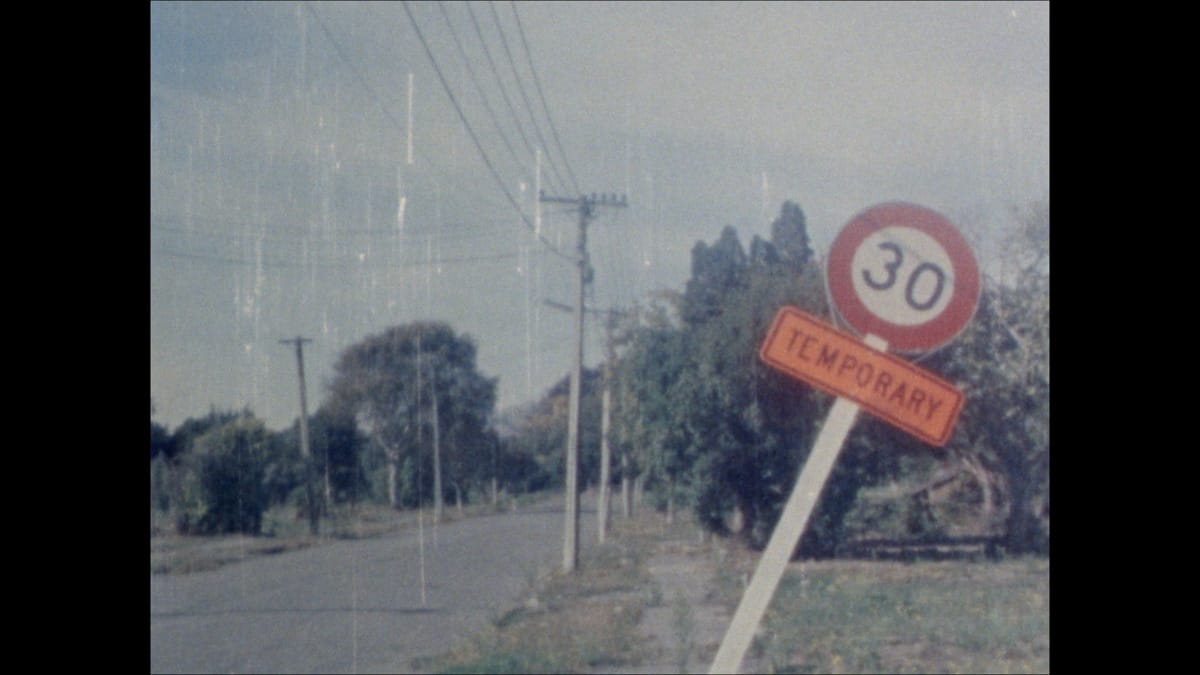 Still image of an abandoned street on super 8mm film.