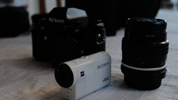 Sony and Nikon camera equipment.