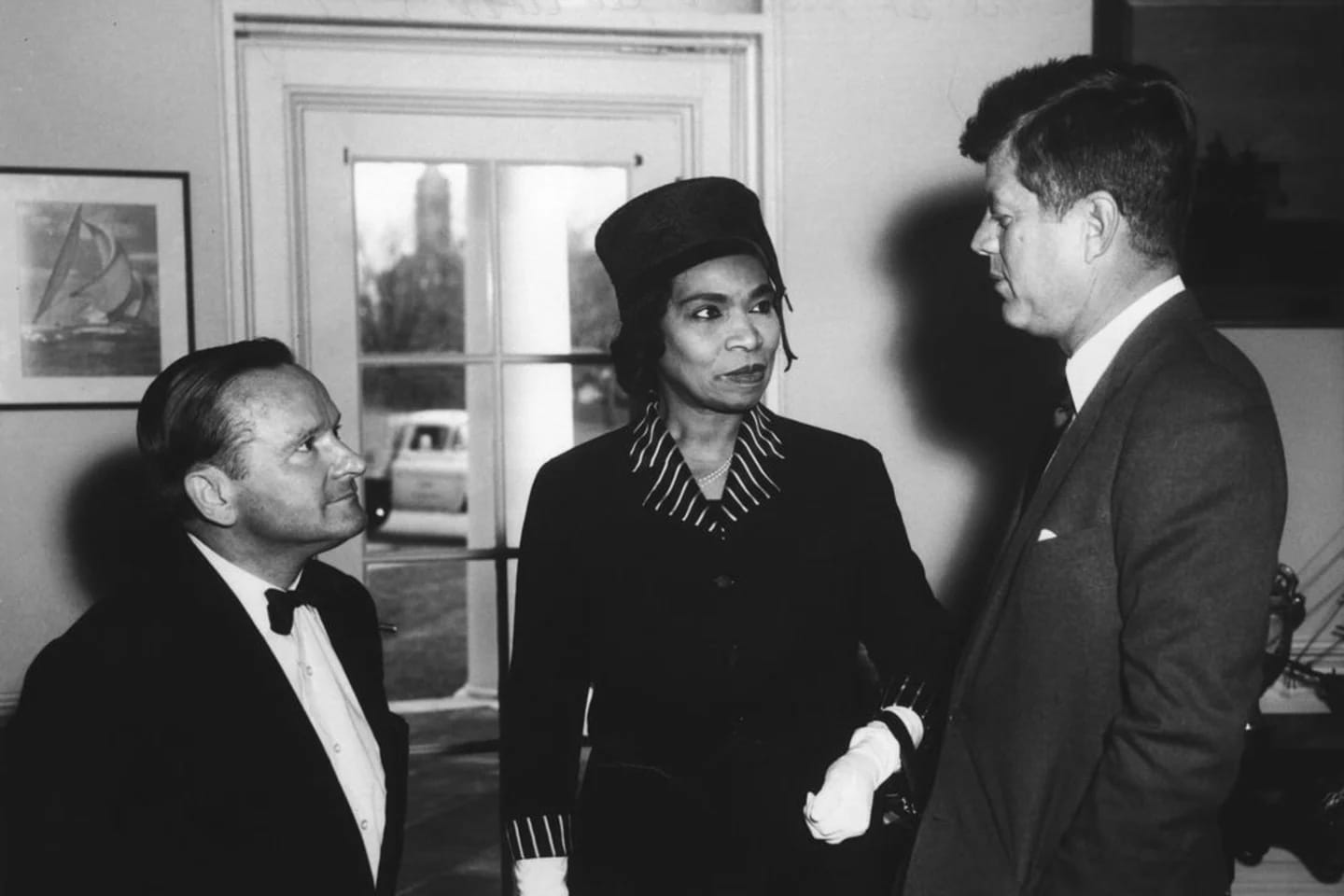 President John F. Kennedy visits with singer Marian Anderson and her accompanist Franz Rupp in the Oval Office in 1962.