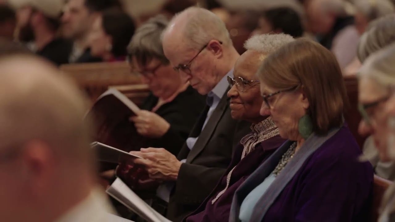 Audience reading along at Riverside Church, April 4, 2026
