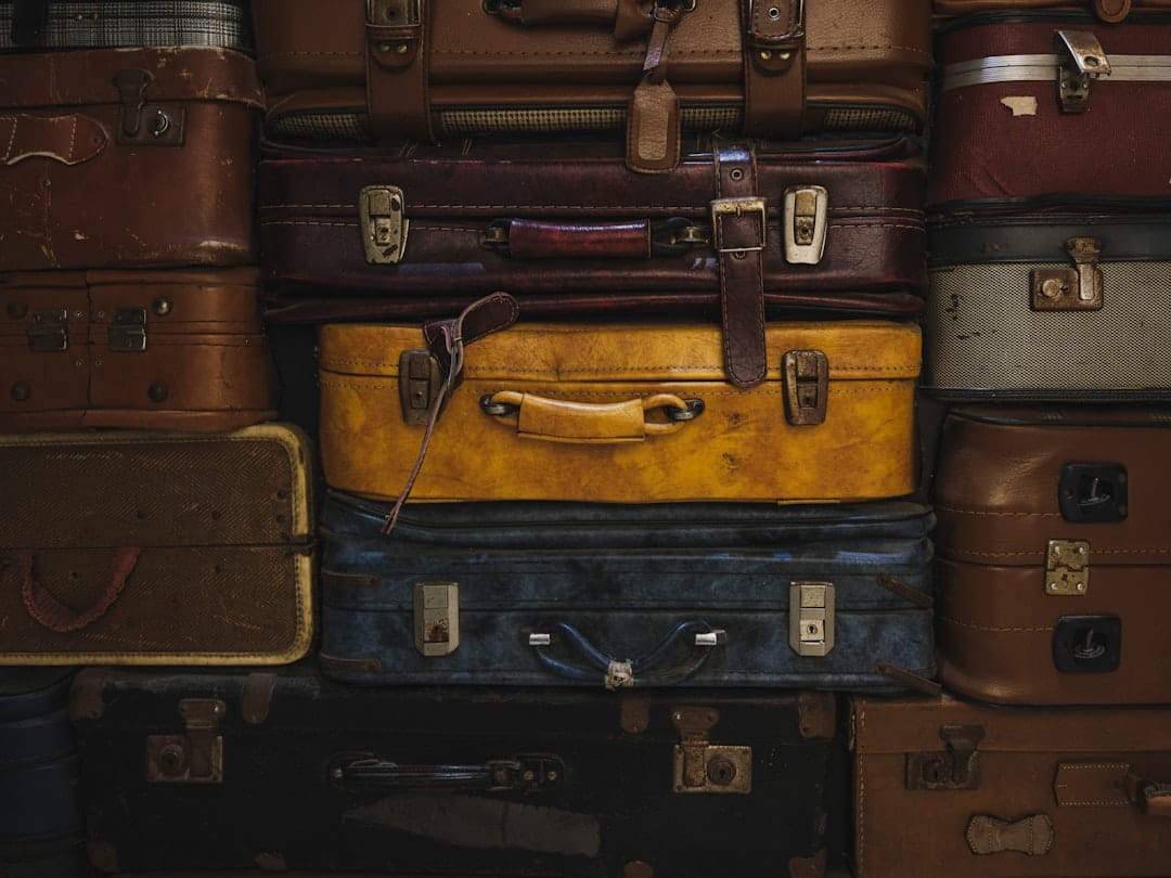 Stack of vintage suitcases in various colors