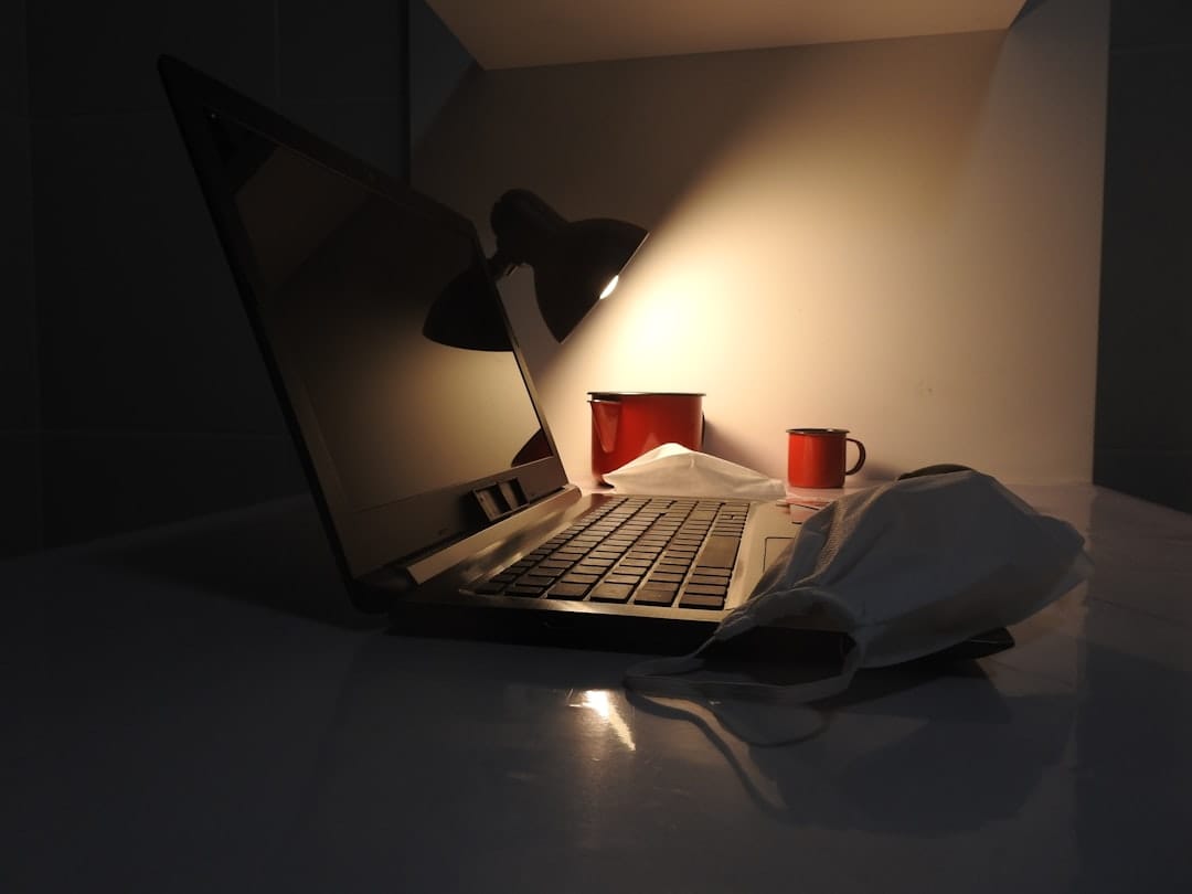 a laptop computer sitting on top of a table