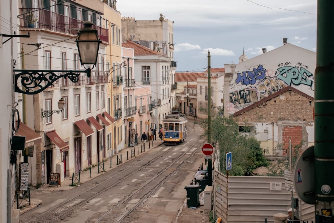 Yellow tram on a street in lisbon, portugal
