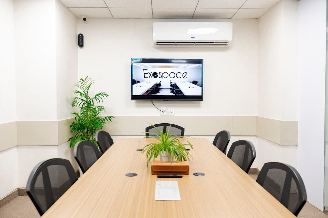 A modern conference room with a tv