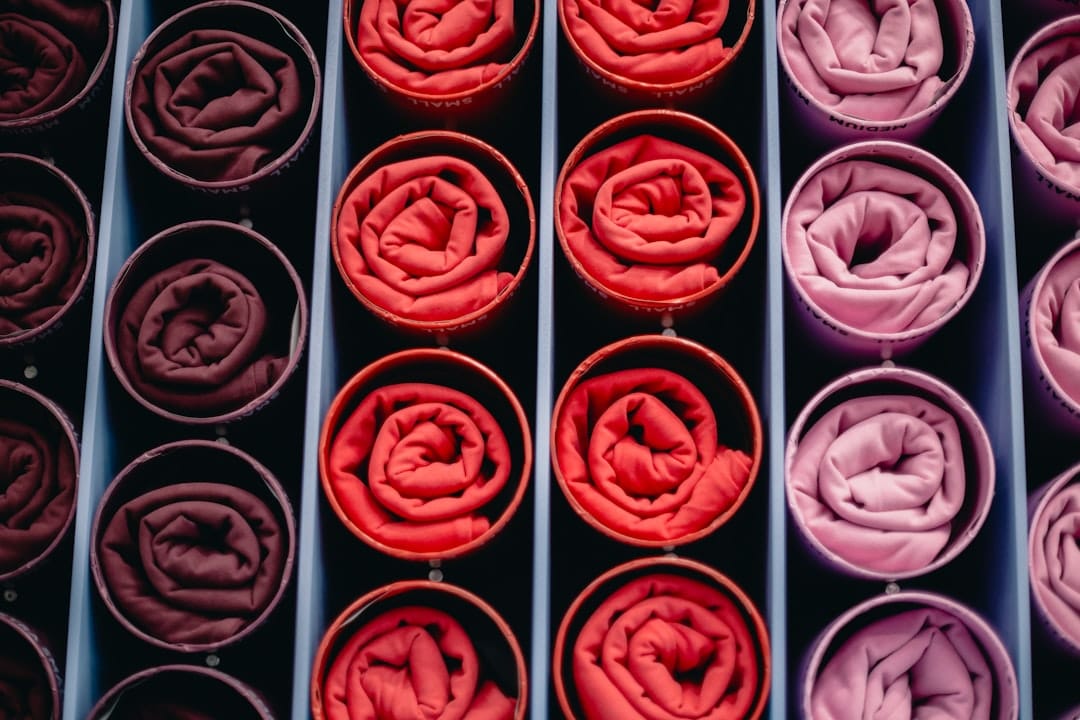 Rolled fabrics in shades of red and pink