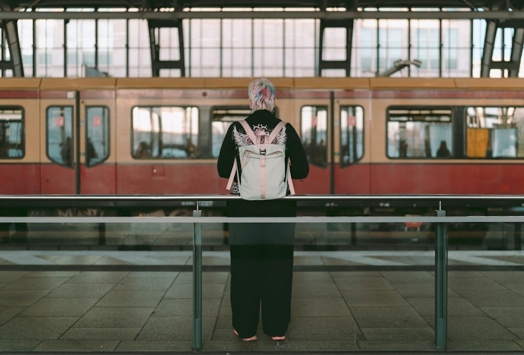 Traveler with backpack on berlin train platform
