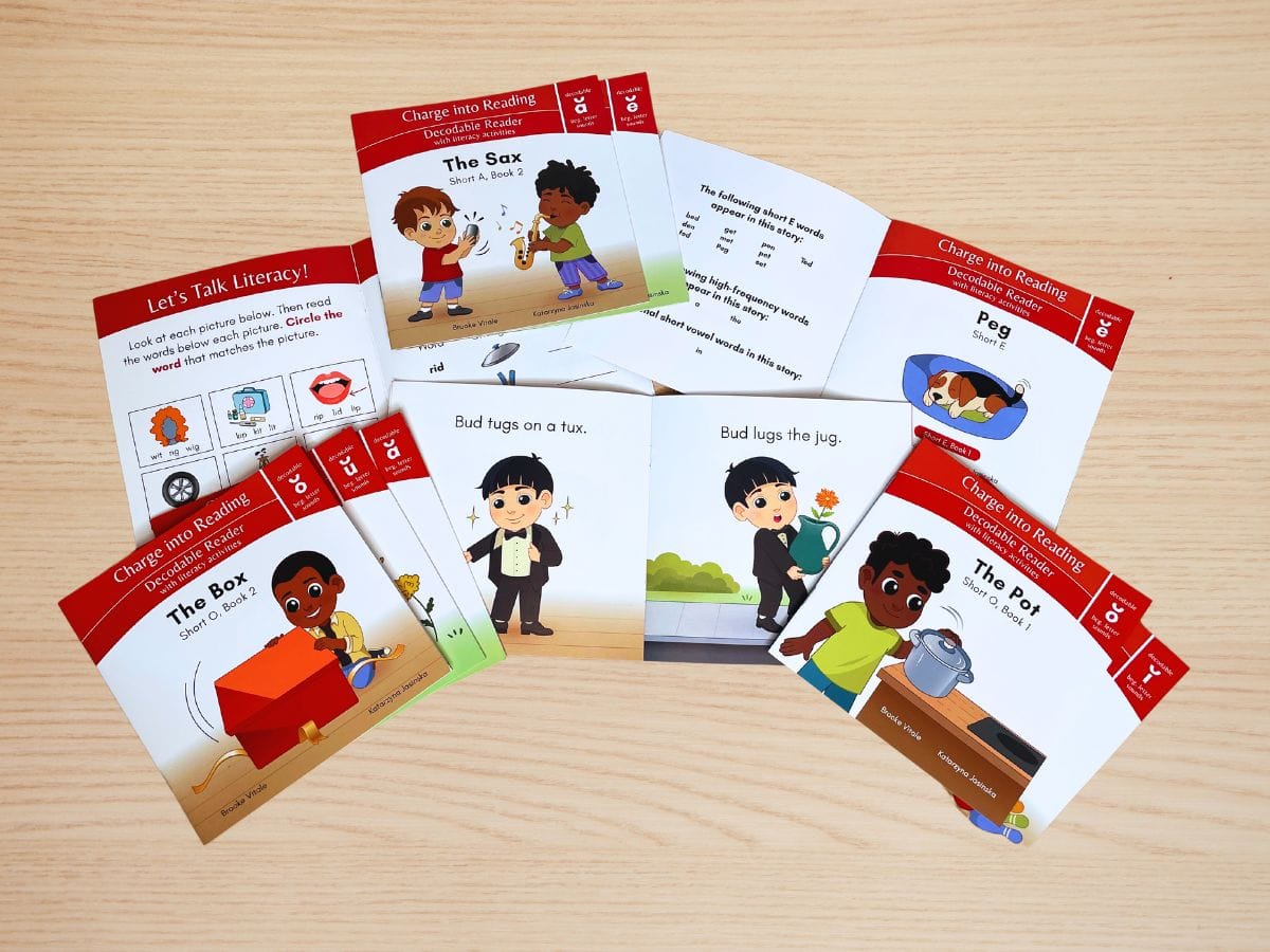 Charge into Reading books by Brooke Vitale, open to their illustrated pages