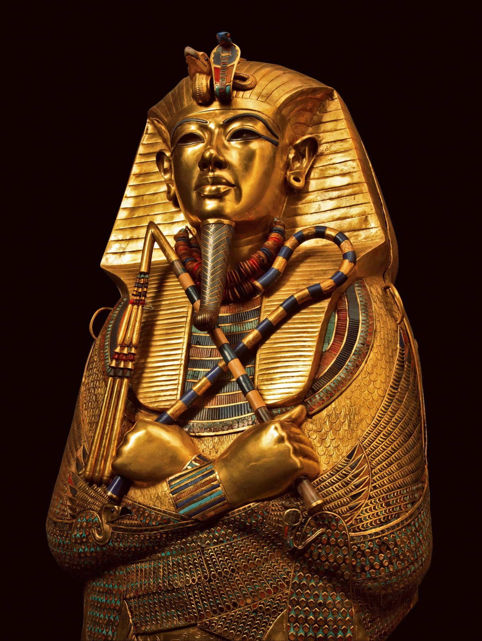 Innermost gold coffin of King Tutankhamun symbolizing ritual death and rebirth in ancient Egyptian initiation traditions