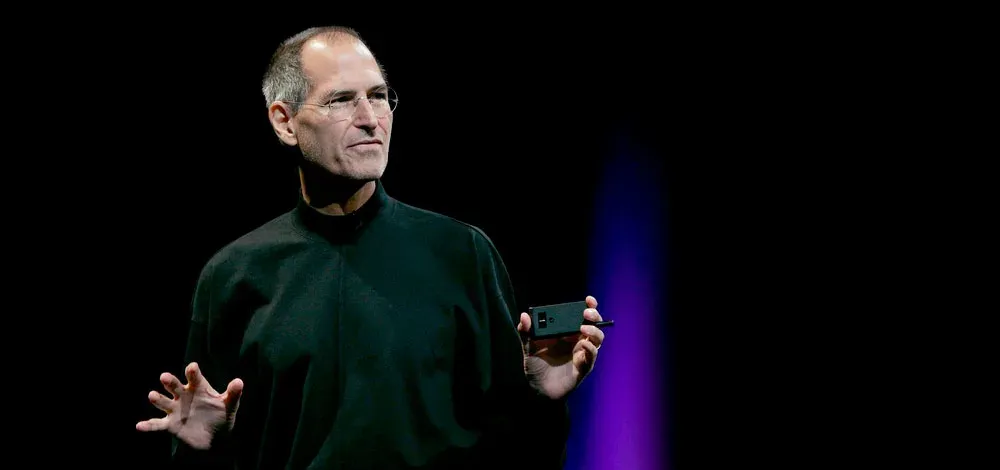 Steve Jobs presenting at Apple WWDC 2010 keynote demonstrating innovation and leadership