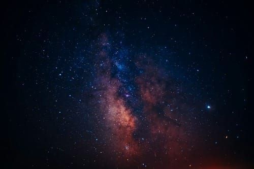 ast star field and nebula in deep space—cosmic backdrop symbolizing infinite possibility and the Law of Assumption.