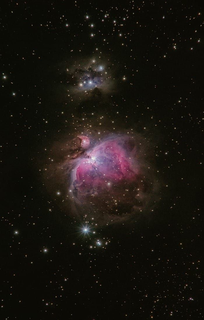 Mystical pink nebula in deep space representing the cosmic mind and the power of the subconscious for manifestation