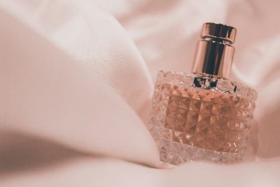 Elegant vintage perfume bottle used in scent anchoring rituals for manifestation, inspired by Cleopatra's perfumed baths