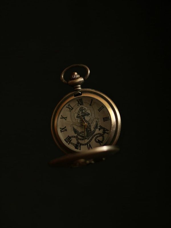Vintage circular hand watch symbolizing time, memory, and the power of Neville Goddard’s Revision technique to reshape past experiences