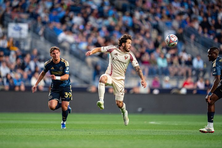 Aaron Herrera jumps to control the ball as Frankie Westfield and Olwethu Makhanya chase him during D.C. United's draw with the Philadelphia Union.