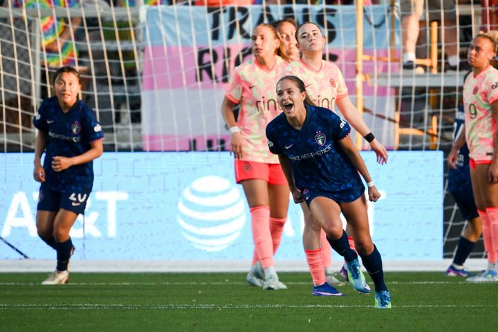 The North Carolina Courage's Ashley Sanchez celebrates a goal against the Portland Thorns.