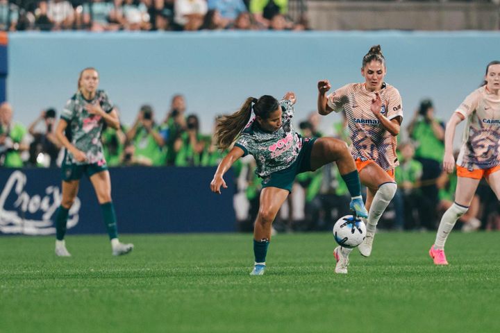 Leicy Santos and Sarah Schupansky battle for the ball as the Washington Spirit played Gotham FC.