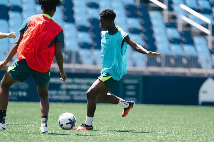 Deb Abiodun prepares to strike the ball during a Washington Spirit training session.
