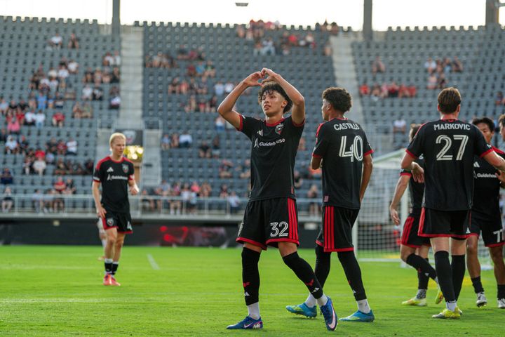 Oscar Avilez celebrates a goal with teammates during D.C. United's game against Loudoun United.