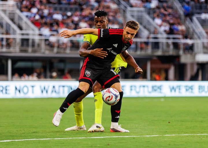 Louis Munteanu attempts to control the ball in D.C. United's game against Nashville SC.