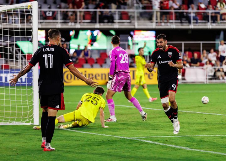 Louis Munteanu and Tai Baribo celebrate the latter's goal as D.C. United played the Columbus Crew.