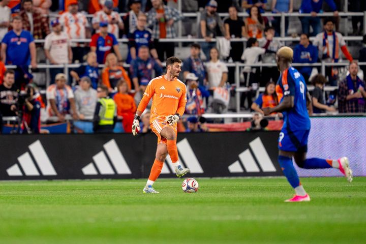 Alex Bono controls the ball during an MLS game between D.C. United and FC Cincinnati.