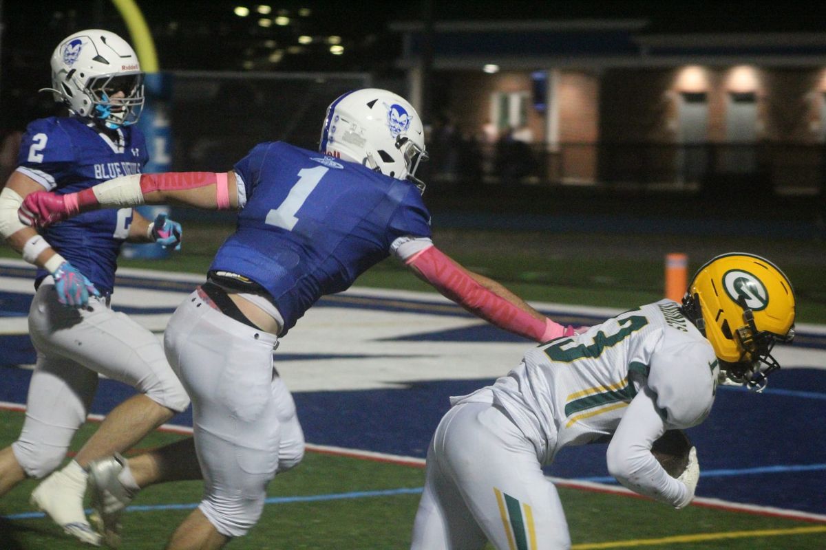 Bishop Guertin football battles through adversity to beat Salem