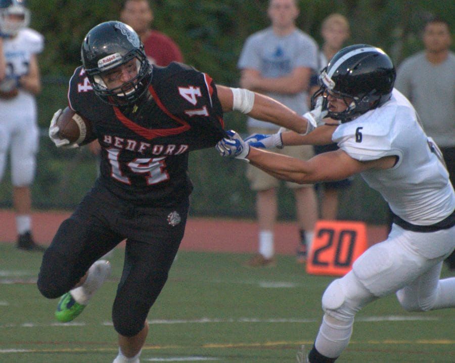 Bedford football takes advantage of miscues to beat Nashua North