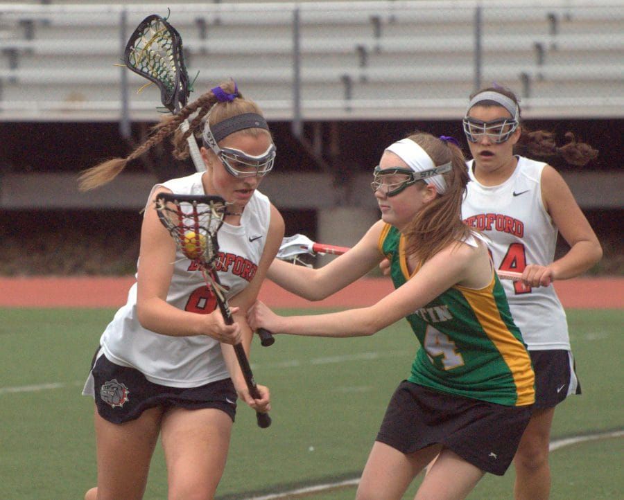 Bedford girls lacrosse comes back to beat Bishop Guertin in overtime (video)