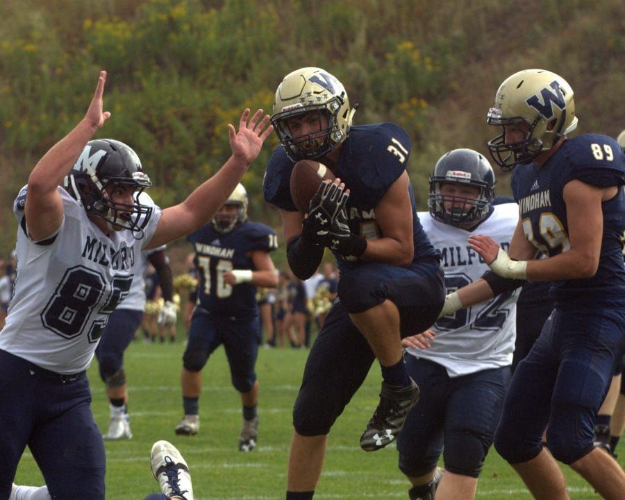 Windham football powers past Milford for victory