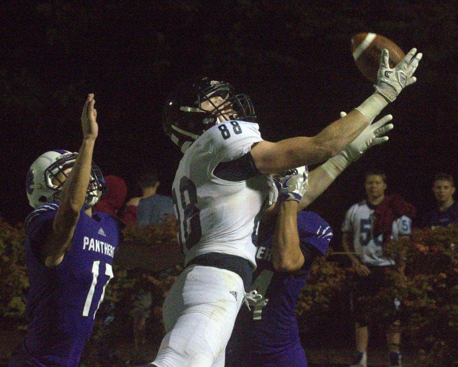 Nashua North football hangs on long enough to beat Nashua South