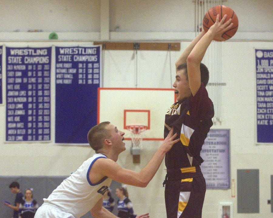 Change in defensive game plan worked well for Hollis Brookline boys basketball