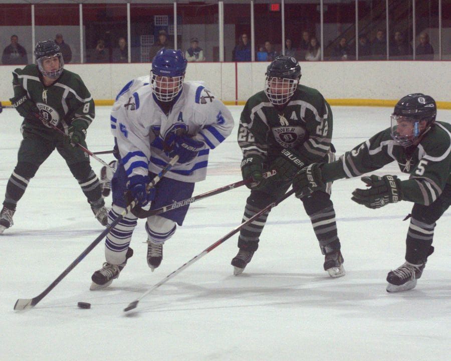 Schlapak giving Dover boys hockey offense from the blue line