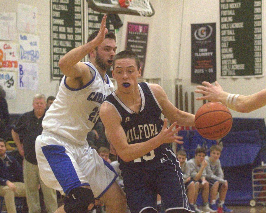 Second-quarter surge lifts Milford boys basketball past Hollis Brookline