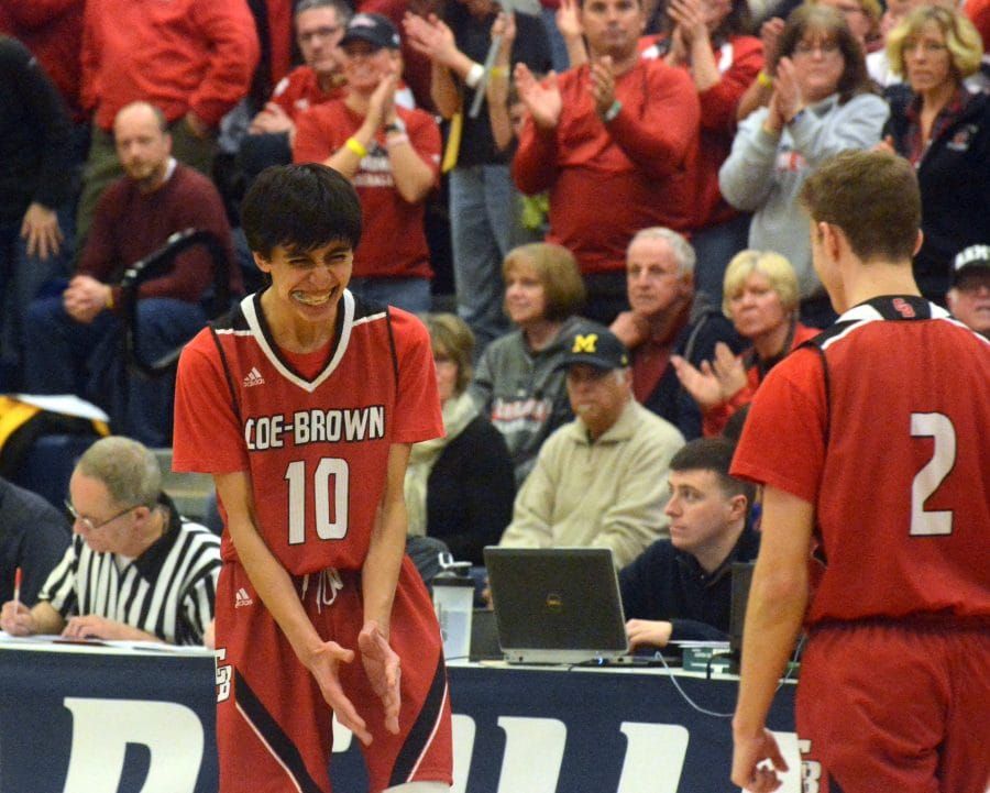 Coe-Brown boys basketball overcomes slow start to beat Milford in D2 semis